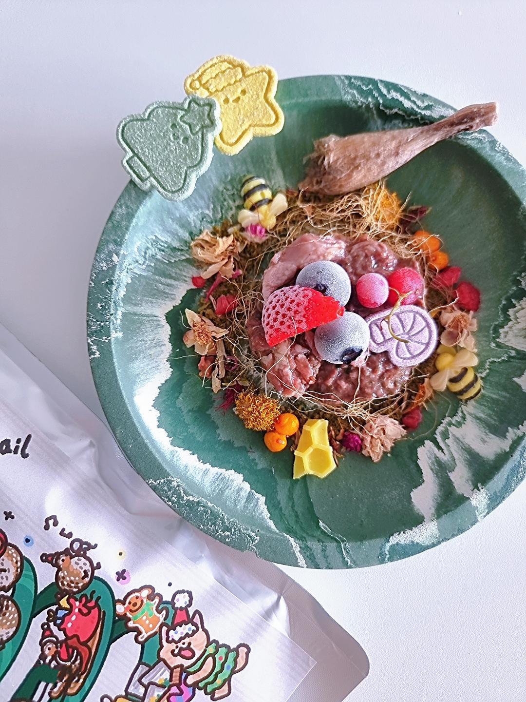 Decorative plate with a bird's nest and small figurines on a white background