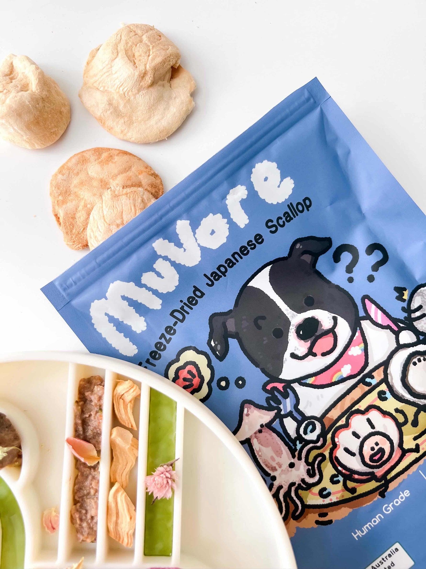 MuVore freeze-dried Japanese scallop package with cartoon dog design on a white background
